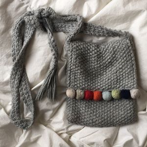 Knitted bag with Pom poms
